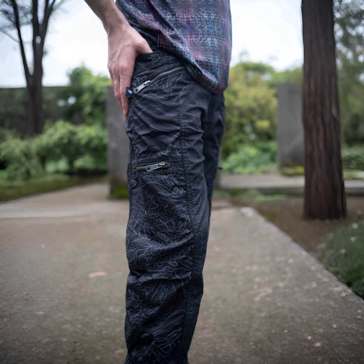 Black psychedelic cargo pants for men with dragon print