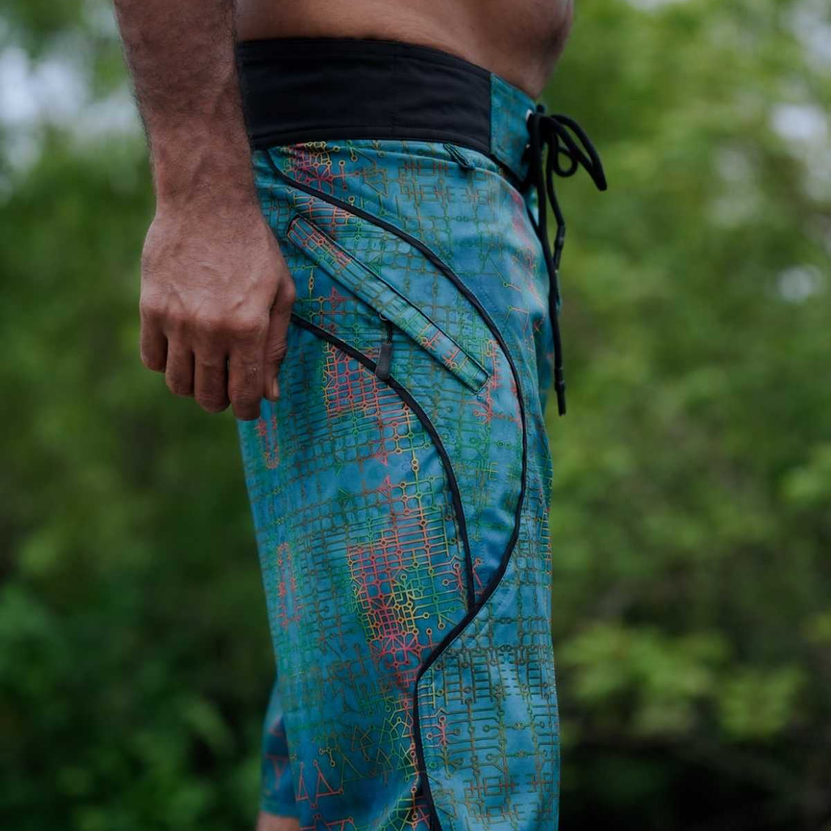 Side view of Blue Dream psychedelic swim shorts with digital print