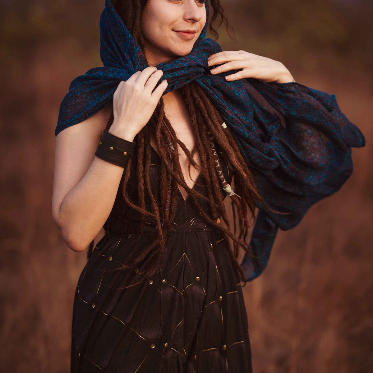 Woman wearing Blue Occult bamboo scarf with digital geometric print