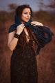 Woman wearing Blue Occult bamboo scarf with digital geometric print
