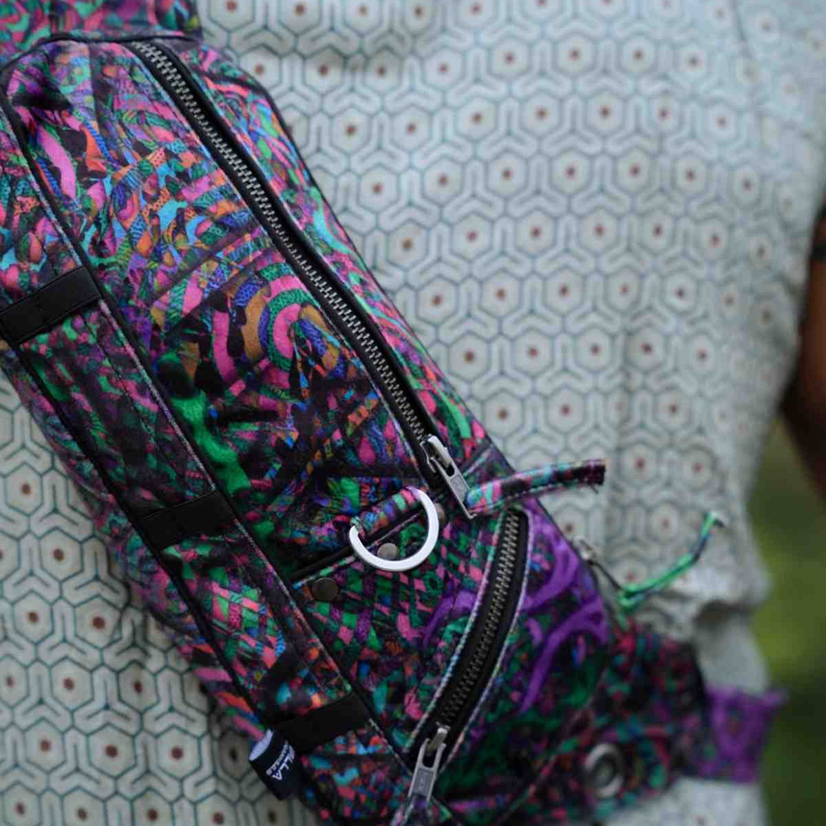 FluxFunk festival sling bag showing adjustable shoulder strap and pockets