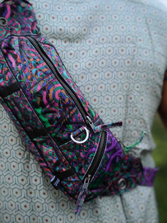 FluxFunk festival sling bag showing adjustable shoulder strap and pockets