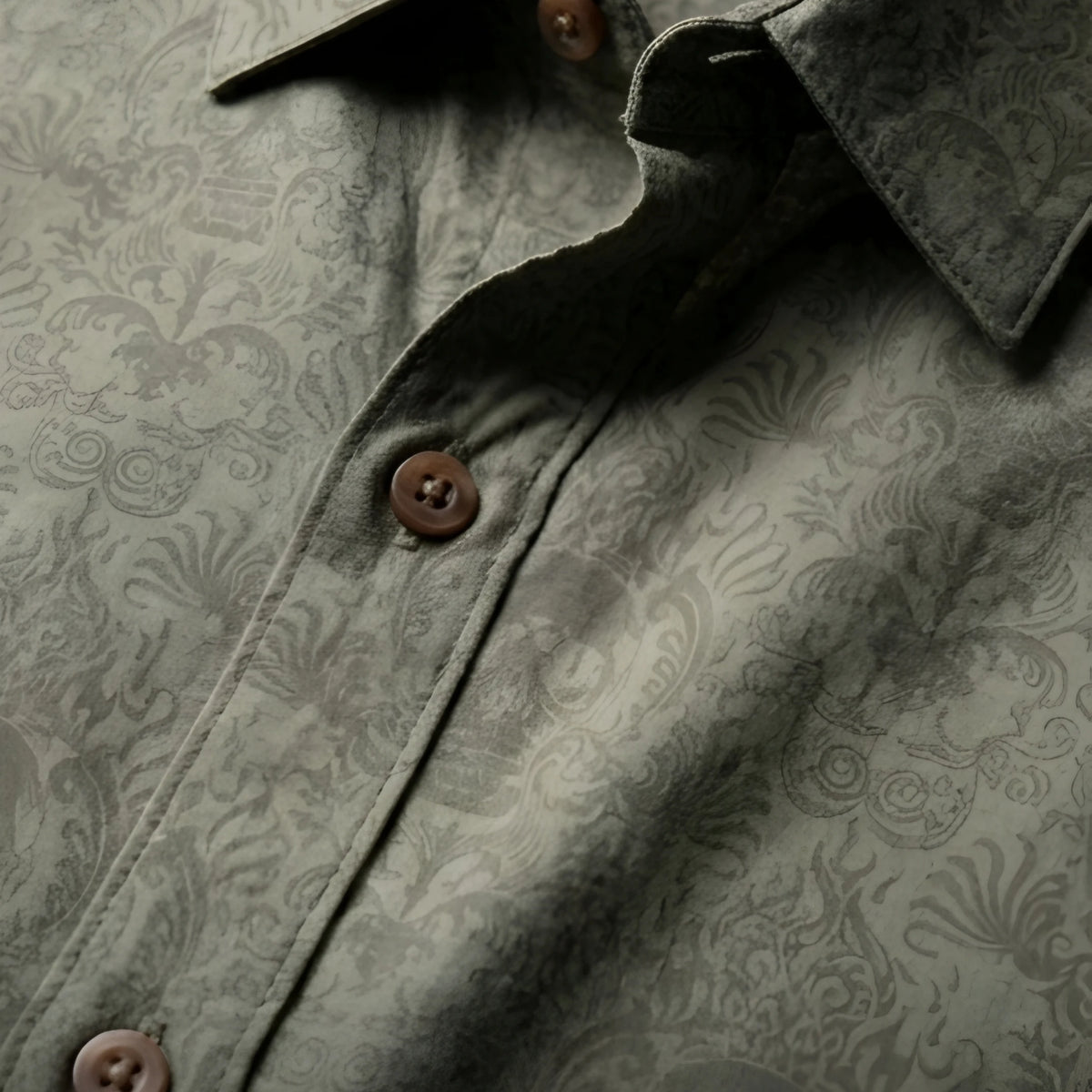 Close-up of khaki Cancun Skull viscose button down shirt showing premium printed fabric