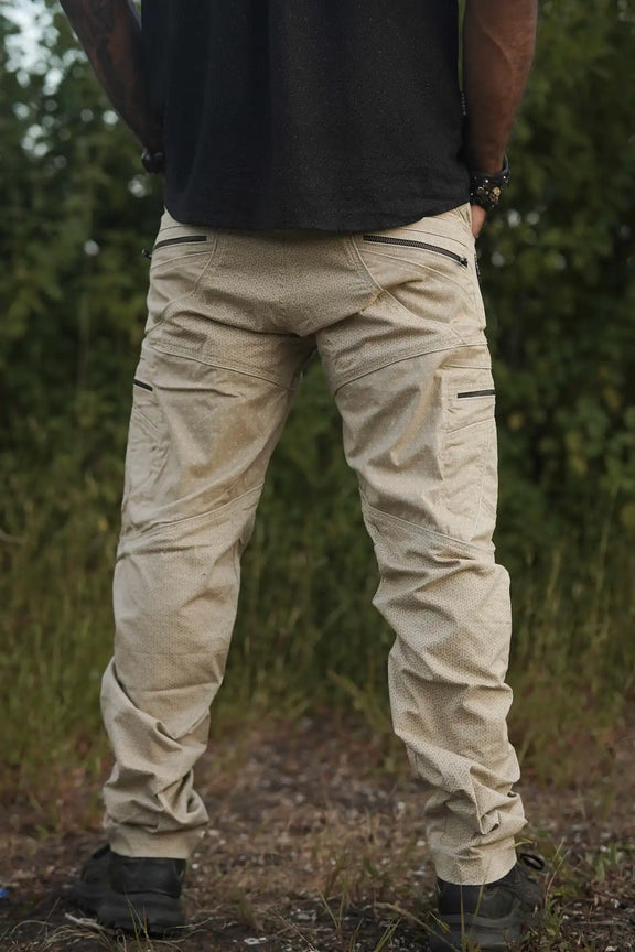 Men's beige cargo pants with geometric psychedelic print back view