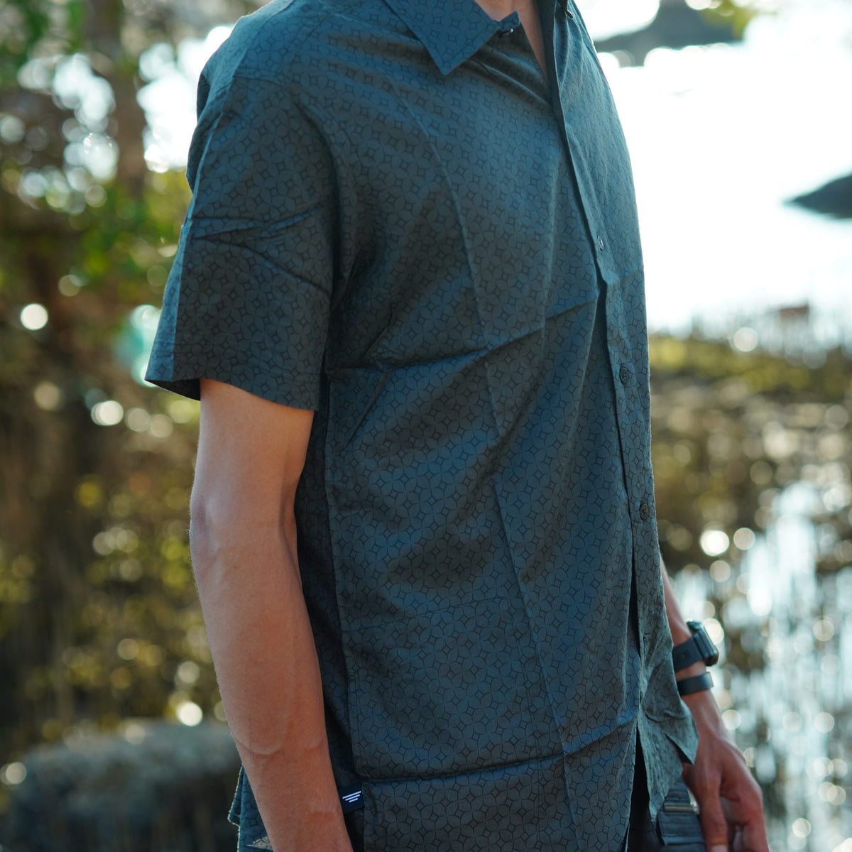 Side view of MERKABA viscose shirt for men featuring subtle geometric screen print