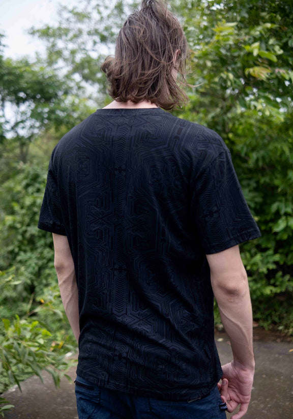 Back view of Metanoia black sacred geometry t shirt featuring all-over geometric artwork by Baabio