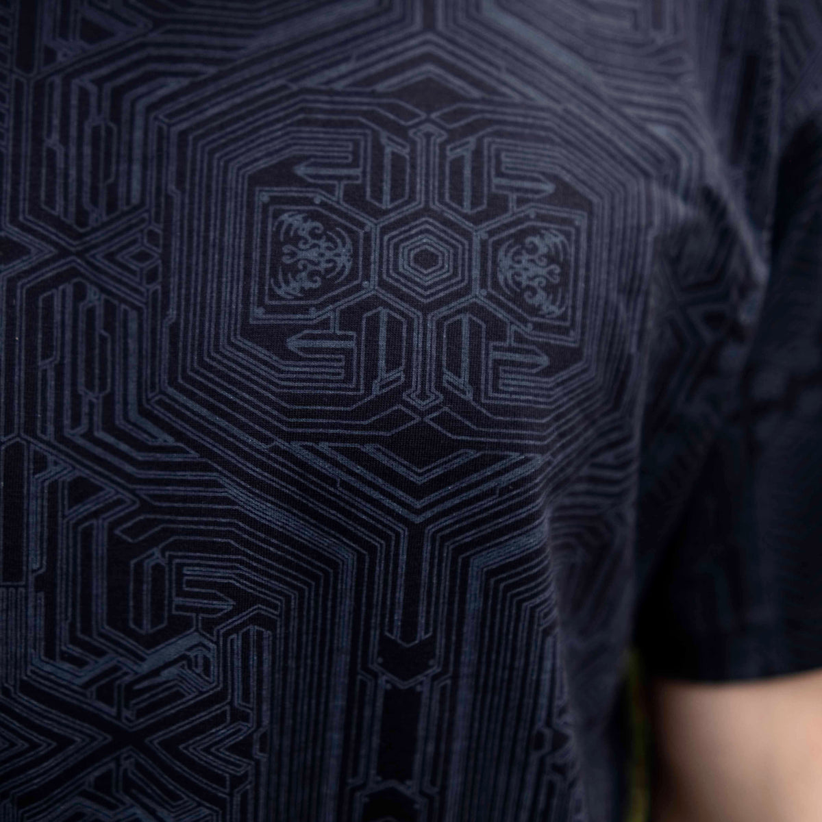 Close-up of Metanoia black sacred geometry t shirt showing intricate geometric artwork on 180 GSM cotton