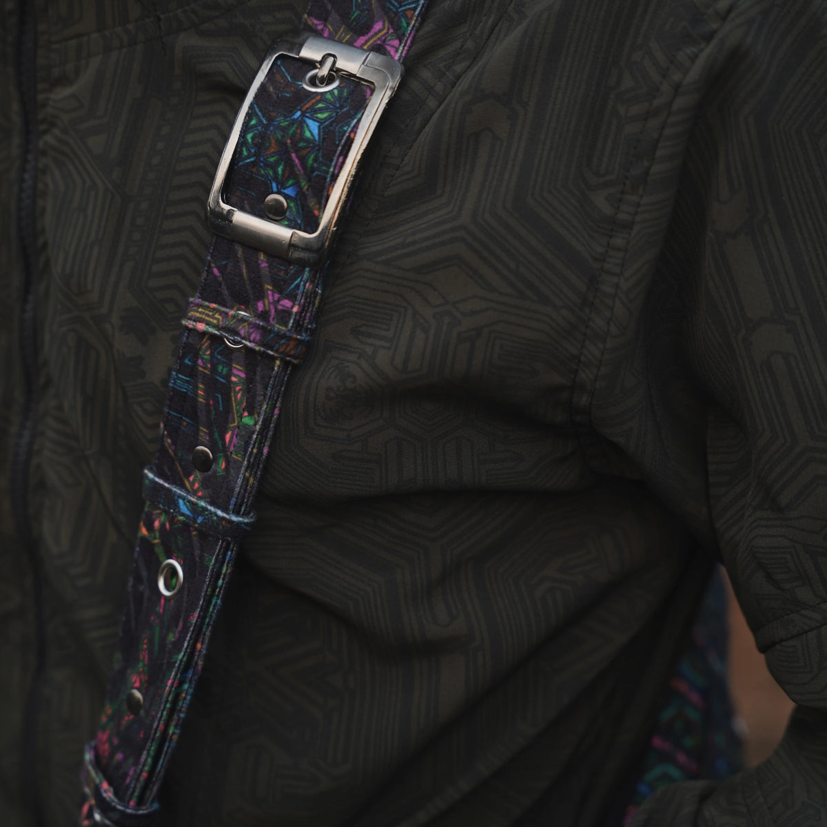Adjustable strap and metal buckle detail on the Mind Flare Aztech 2.0 crossbody bag