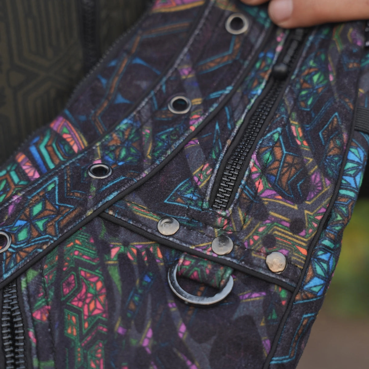 Mind Flare Aztech 2.0 crossbody bag worn over the shoulder with its geometric print on display