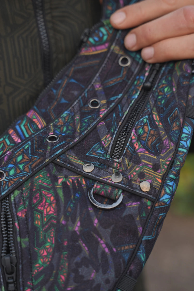Mind Flare Aztech 2.0 crossbody bag worn over the shoulder with its geometric print on display