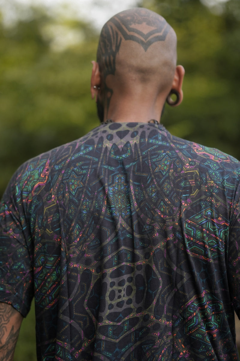 Close-up back view of Mind-Flare bamboo modal psychedelic T shirt featuring vibrant digital geometric artwork