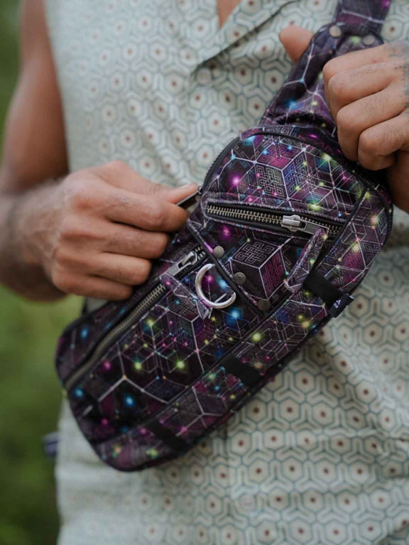 NEUROSOMATIC psychedelic crossbody bag with multiple zippered compartments