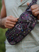 NEUROSOMATIC psychedelic crossbody bag with multiple zippered compartments
