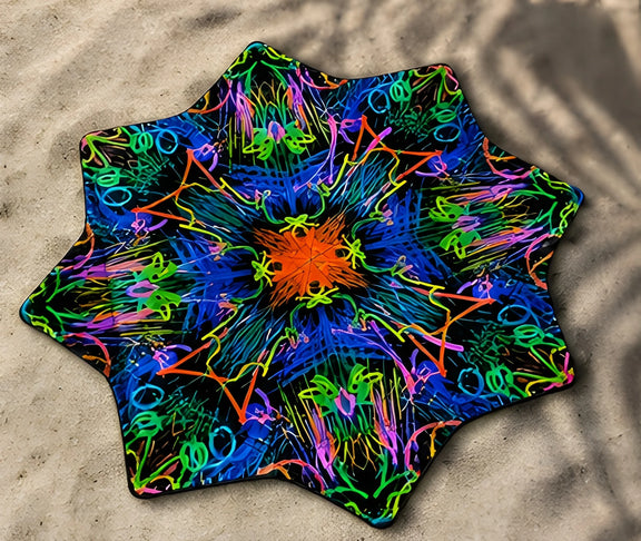 Neon Bloom DAPOSTAR spinning cloth on beach sand with identical double-sided psychedelic print