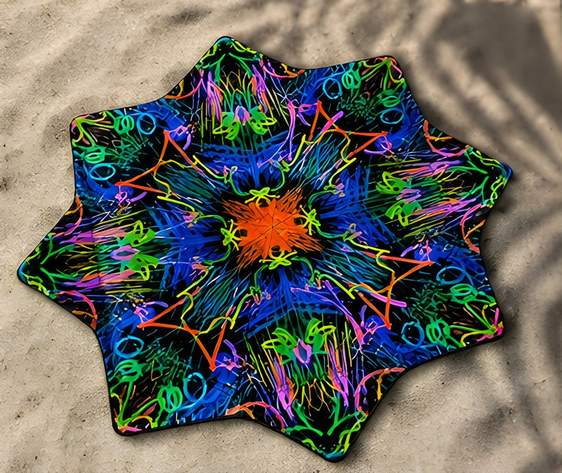 Neon Bloom DAPOSTAR spinning cloth on beach sand with identical double-sided psychedelic print