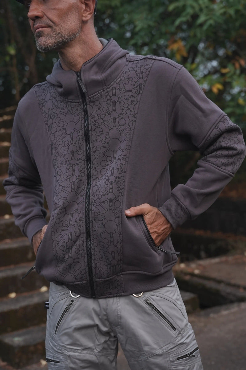 Fractal Gravity grey zip-up hoodie showing patterned front panels and zippered pockets