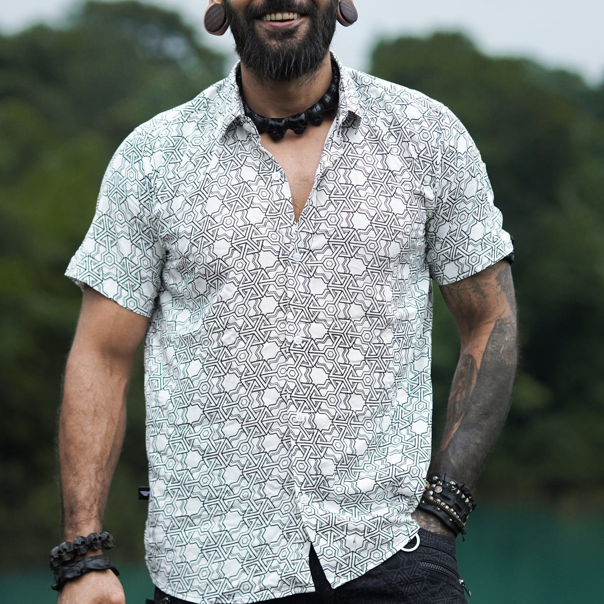 Front view of Pythagoras white men's viscose shirt with all-over sacred geometry pattern