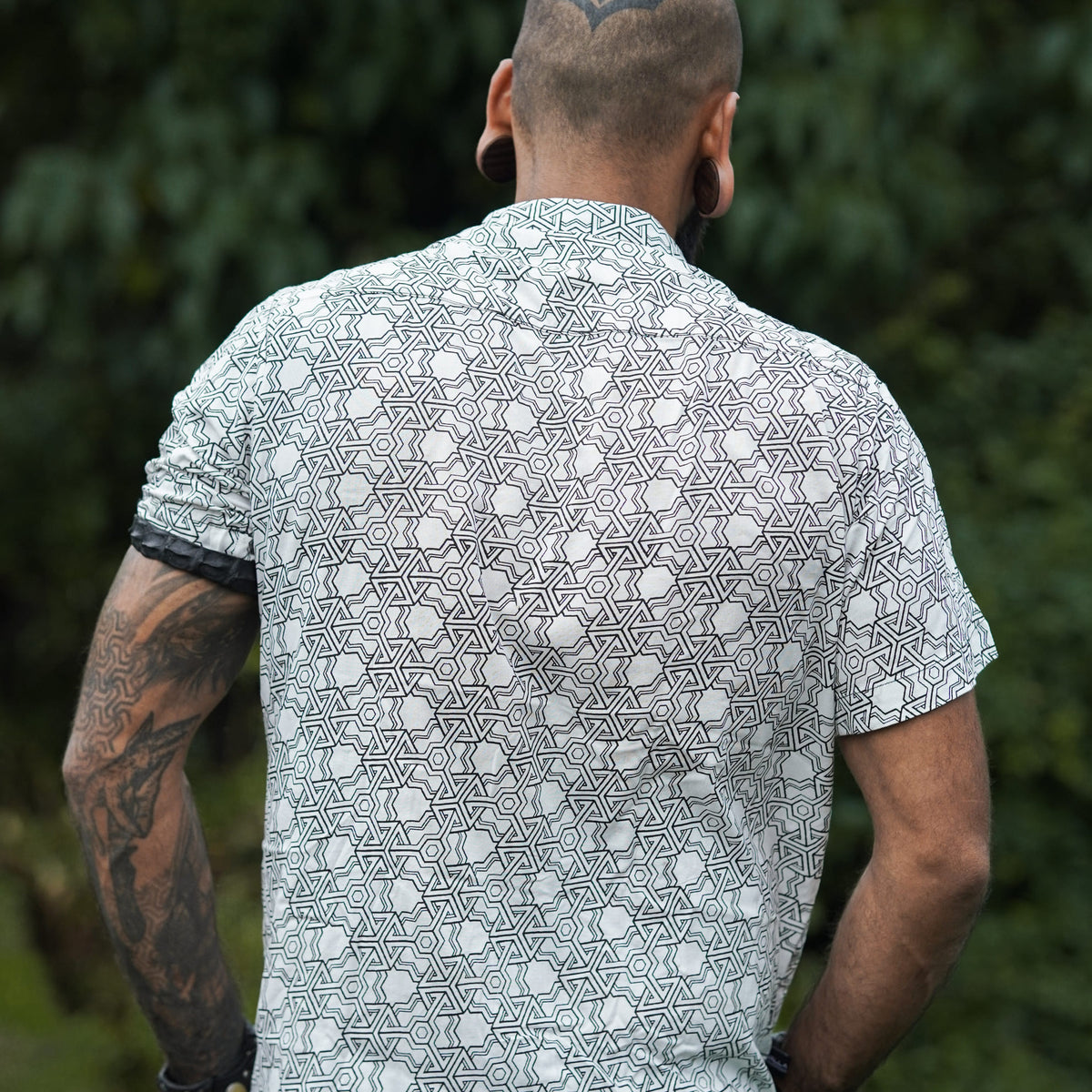 Back view of Pythagoras white men's viscose shirt featuring full sacred geometry artwork