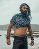 Realm of Metatron bamboo scarf featuring sacred geometry print worn as a hooded festival scarf