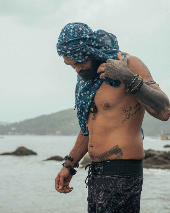 Realm of Metatron bamboo scarf with blue sacred geometry digital print styled as a shoulder wrap