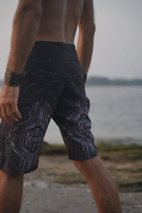 Side view of Star Dust printed board shorts highlighting the longer leg cut and geometric artwork
