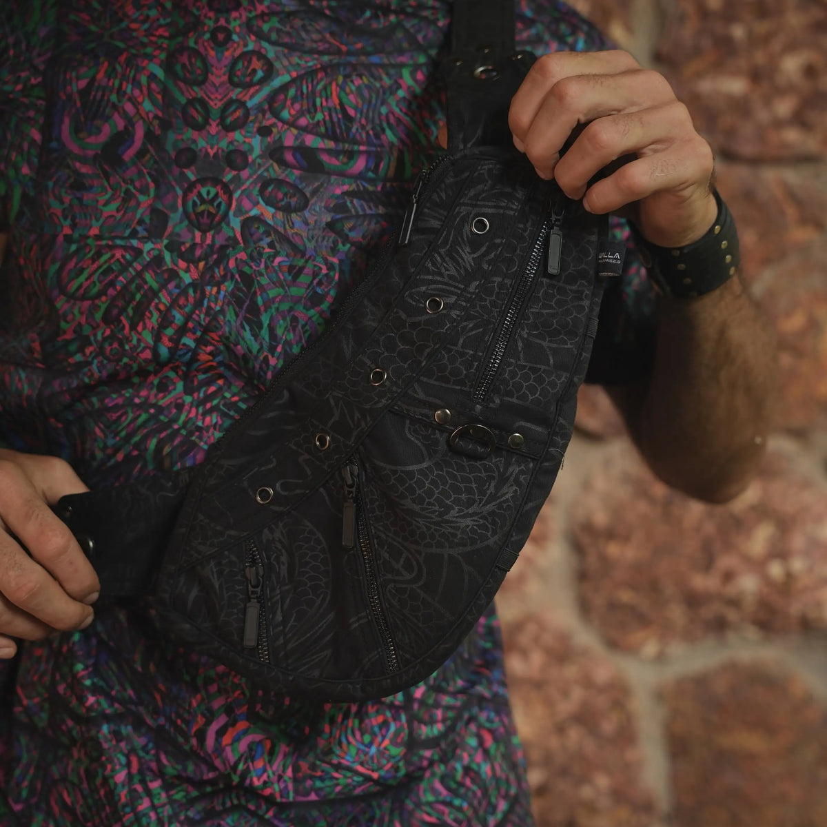 Vanta Dragon cotton canvas crossbody bag worn across the body with dark dragon-inspired artwork