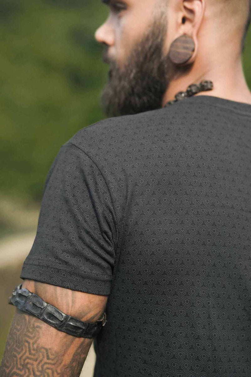 Rear view of Clover Vortex black psychedelic cotton t shirt with all-over screen printed pattern