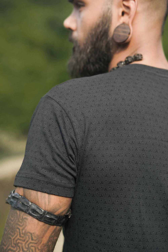 Rear view of Clover Vortex black psychedelic cotton t shirt with all-over screen printed pattern