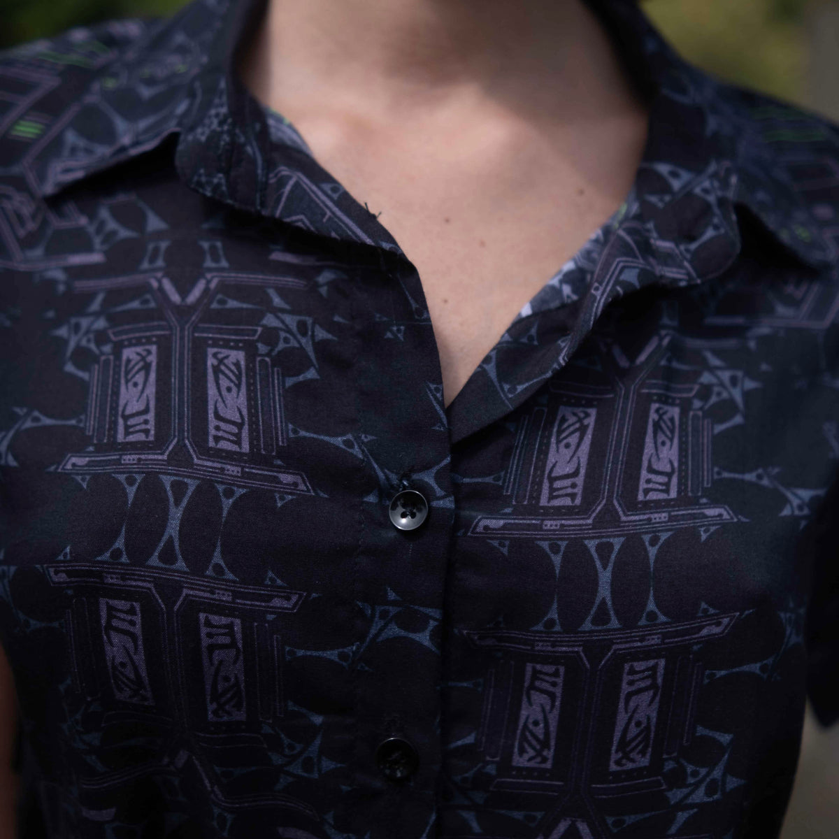 Model wearing Xenomorph abstract cropped shirt made from bamboo fabric