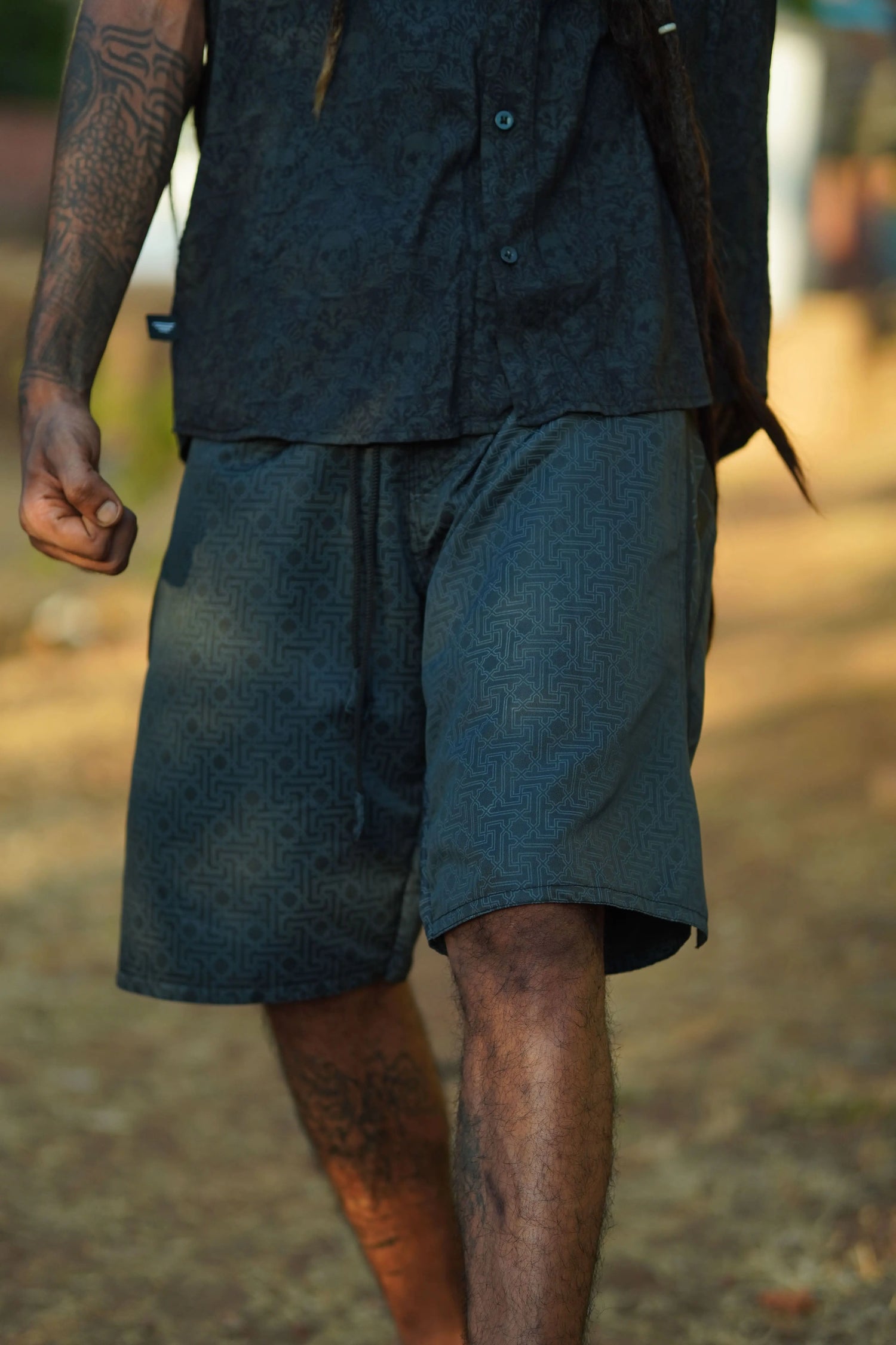 black geometric swim shorts for men yantra design front view