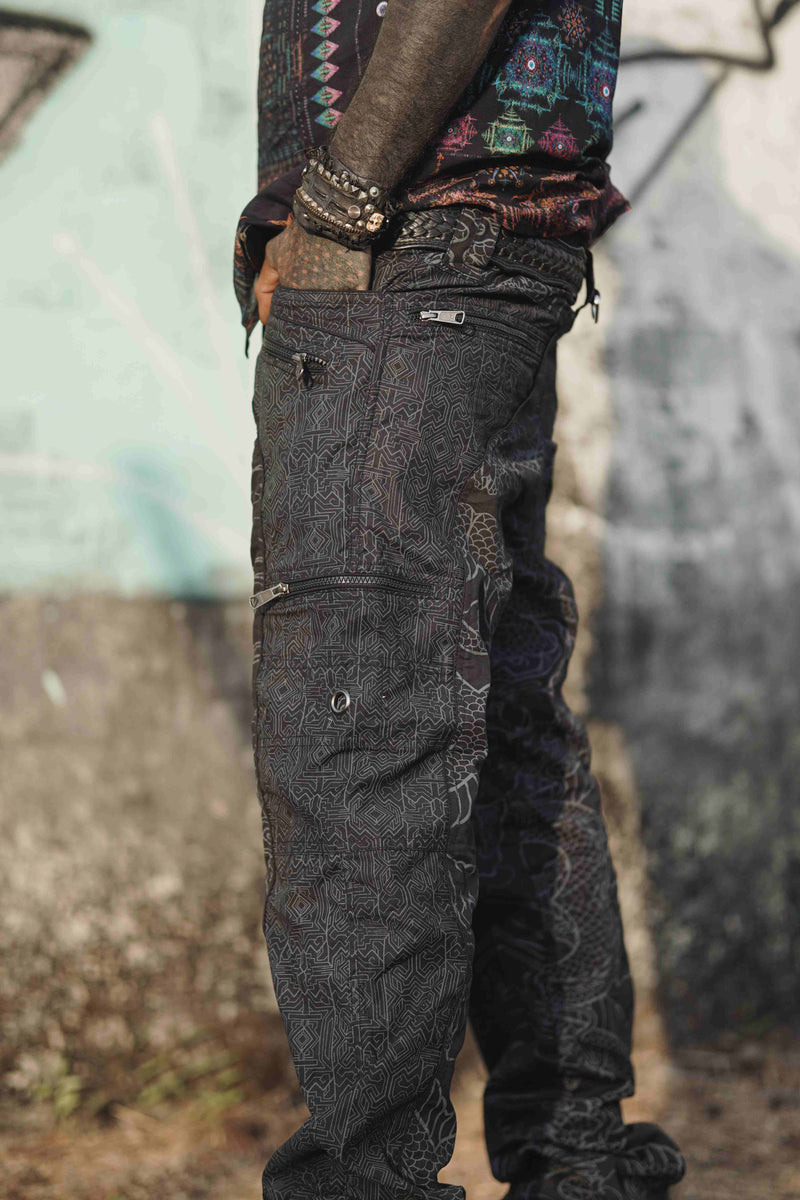 Side pockets and drawstring close-up of black cotton cargo trousers