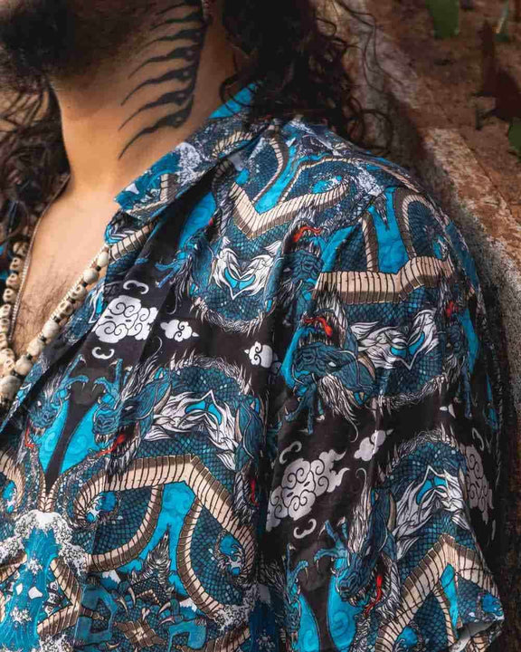 Eco-friendly men's bamboo shirt with vibrant dragon and cloud design, made from breathable biodegradable bamboo fabric.