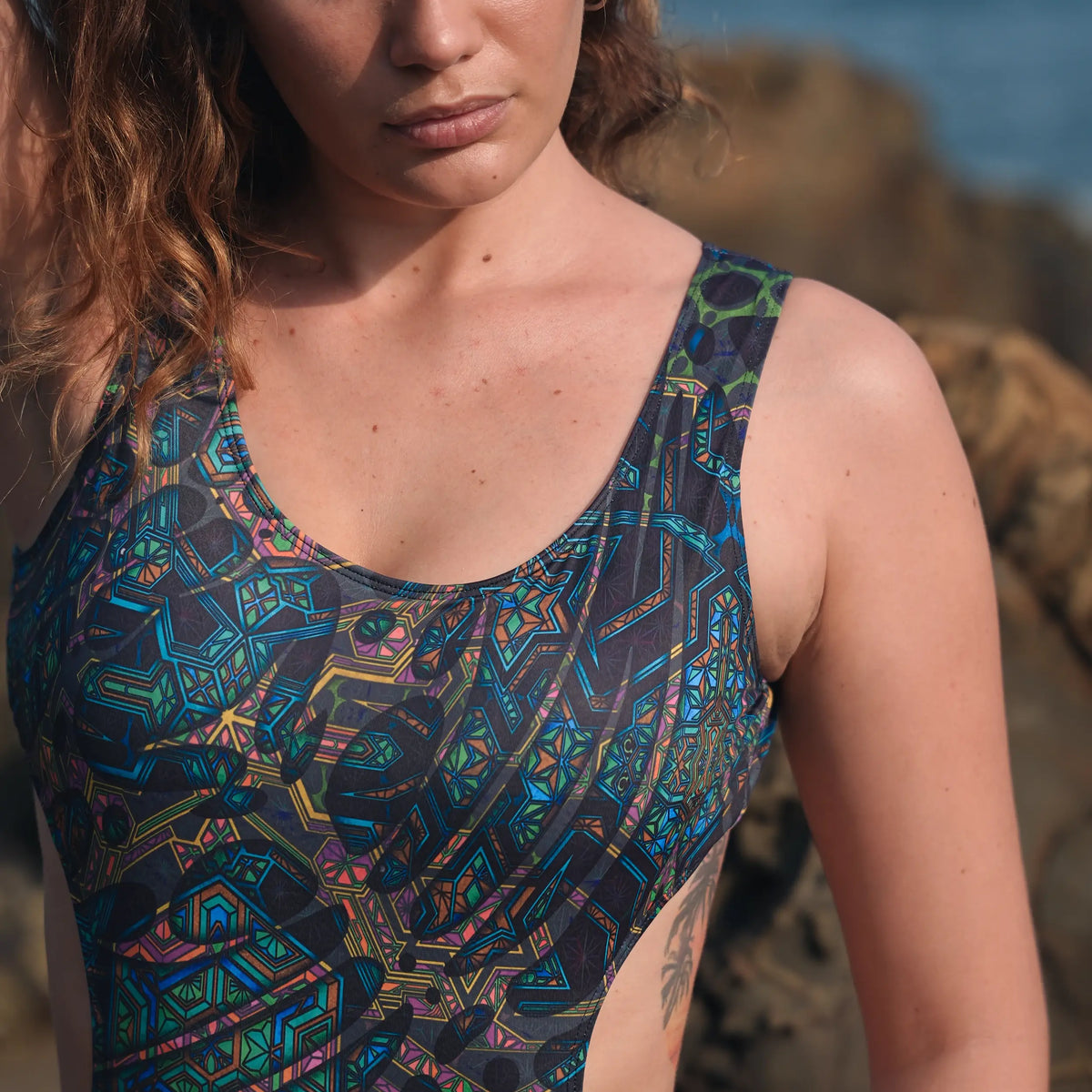 Close up of psychedelic geometric print one piece swimsuit for women